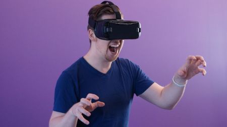 man wearing black virtual reality goggles